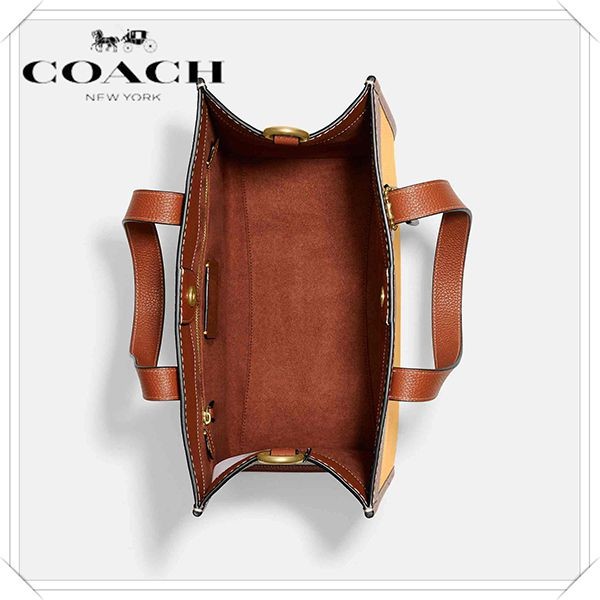 売り切れ頻発!コーチ ディズニー フィールド トート ウィズ ウォルト偽物 C8551