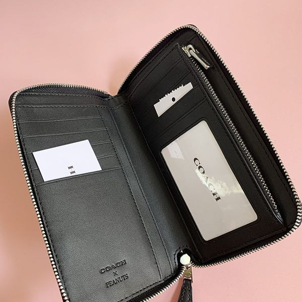 【関税・送料込】【コーチ x スヌーピー】●レア!●機能的でコンパクトなお財布
