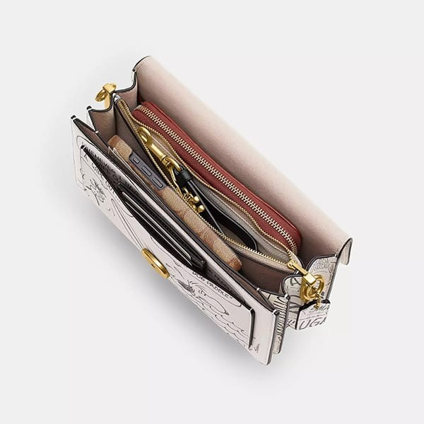 すぐ届スヌーピー限定コラボ【コーチ】タビーショルダーバッグ26 CCB04